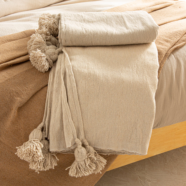 Plaid à pompons marocain beige clair