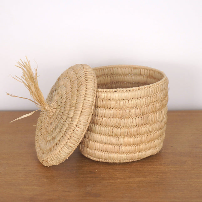 Boîte de rangement ronde en raphia naturel