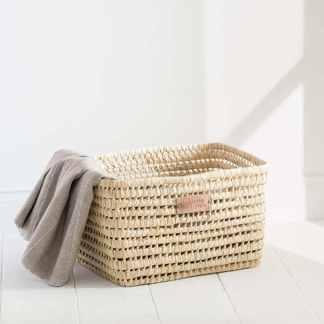 Panier de rangement en feuilles de palmier