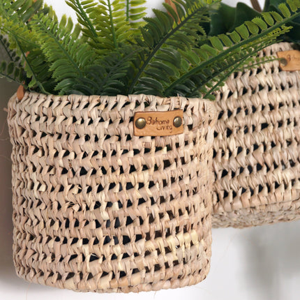 Cache pot suspendu en palme et cuir