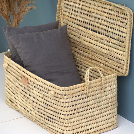 Malle de rangement pour le salon en osier