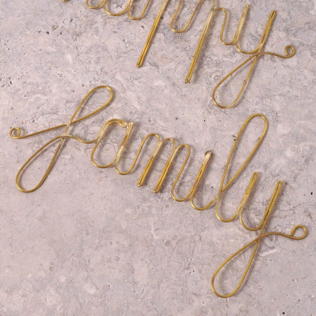 Mot en laiton doré - happy family