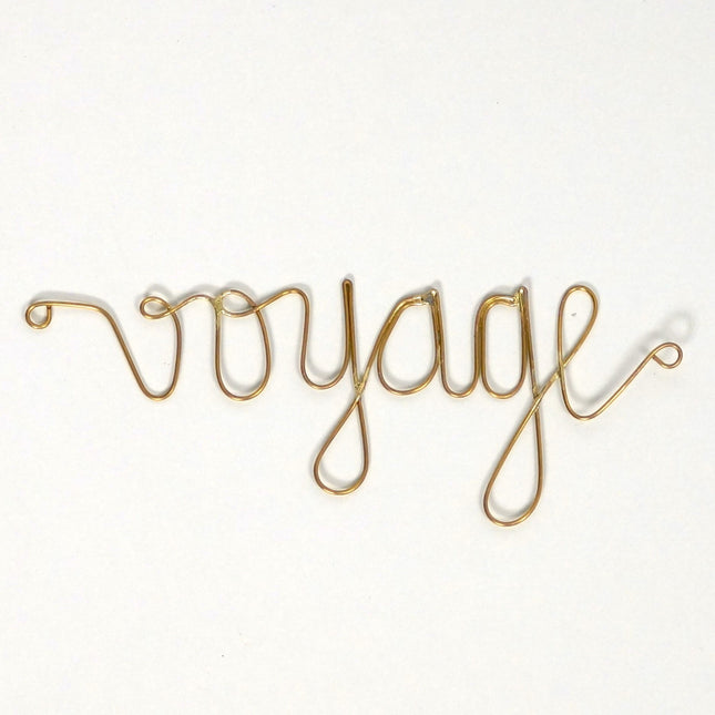 Mot en laiton doré - Voyage