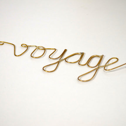 Mot en laiton doré - Voyage