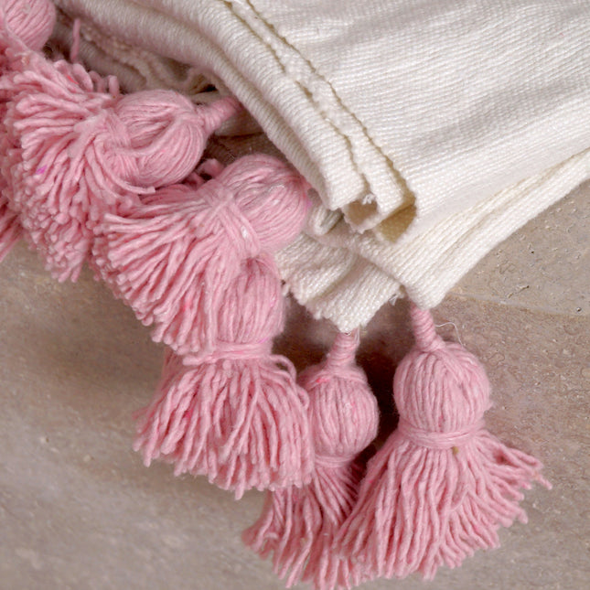Petit plaid blanc à pompons roses