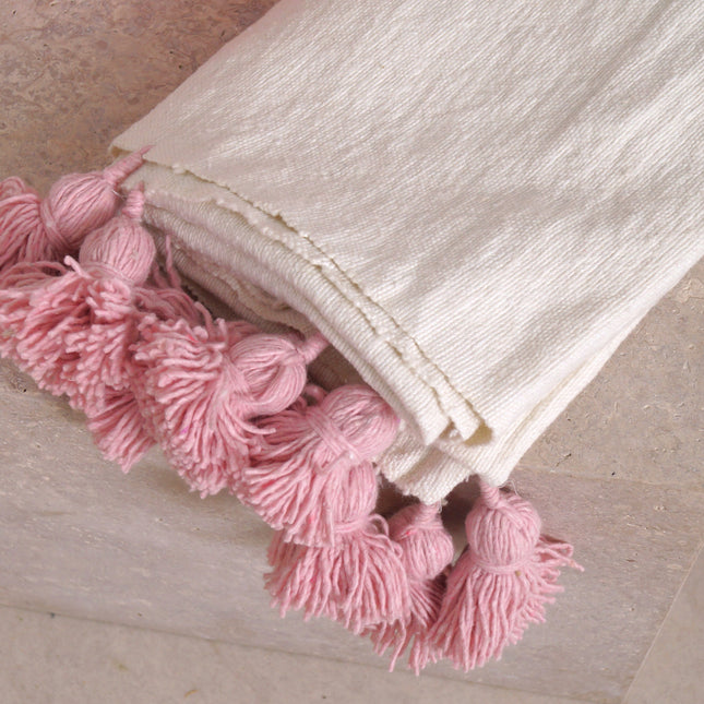 Petit plaid blanc à pompons roses