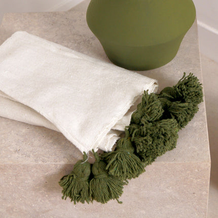 Petit plaid blanc à pompons verts