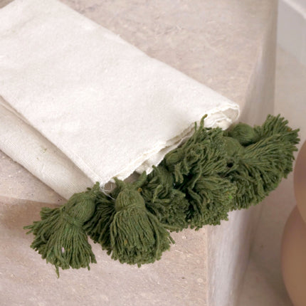 Petit plaid blanc à pompons verts