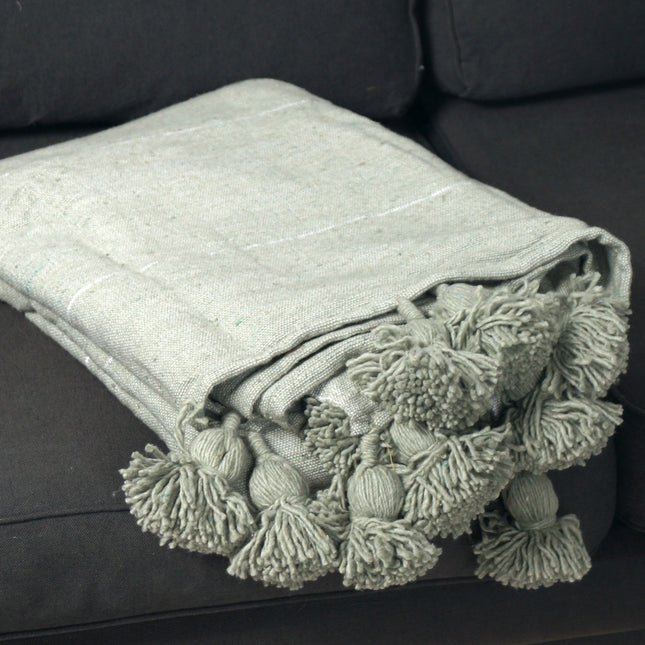 Plaid à pompons kaki rayures argentés