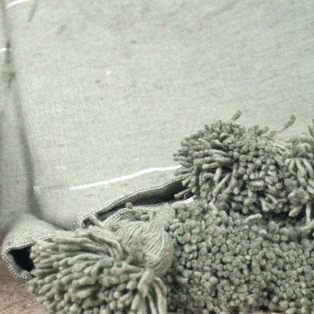 Plaid à pompons kaki rayures argentés