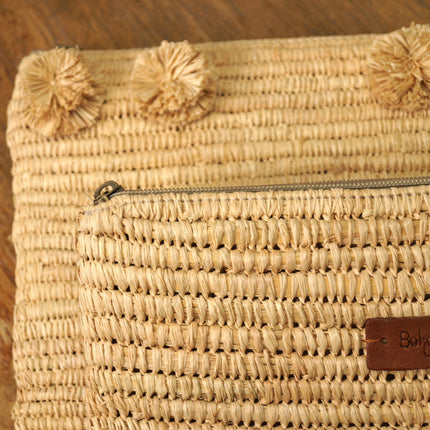 Pochette pour femme en raphia avec pompons