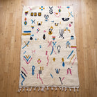 Tapis berbère Azilal Multi-symboles 268 × 163 cm - Dessins multicolores