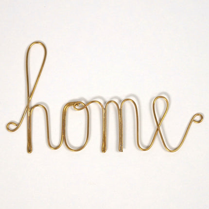 Mot en laiton doré - home