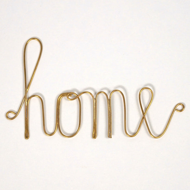 Mot en laiton doré - home