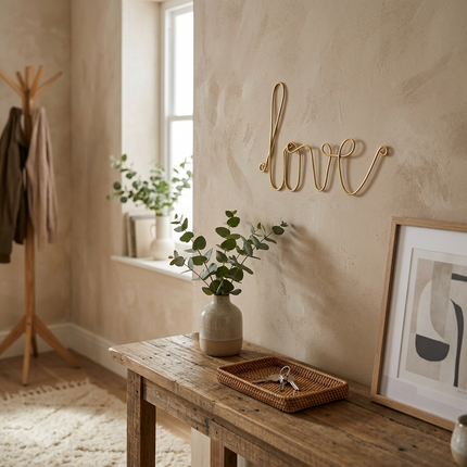 Mot en laiton doré - love