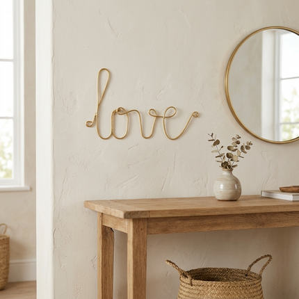 Mot en laiton doré - love