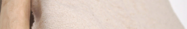 Plaid à pompons marocain beige clair rayures dorées