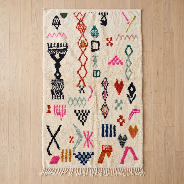Tapis berbère Azilal Multi-symboles 264 × 153 cm - Dessins multicolores