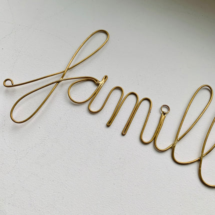 Mot en laiton doré - Famille