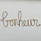 Mot en laiton doré - Bonheur